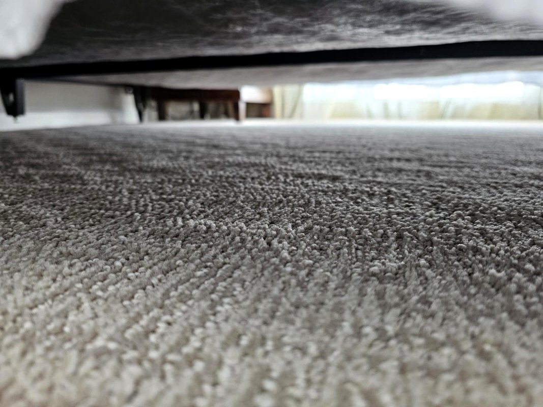 Freshly made king bed — verified clean