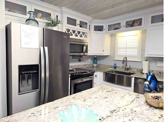 Beach condo kitchen with coastal decor - StayReady verified clean